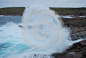 Waves breaking on rocky coast