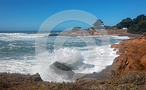 Waves breaking on rocky coast at Moonstone Beach in Cambria California United States