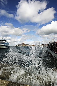 Waves breaking in Rovinj port