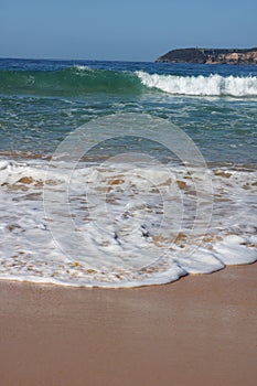 Waves breaking on the sea shore