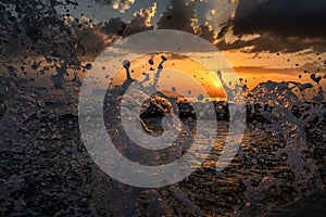 The waves breaking on a stony beach after summer storm