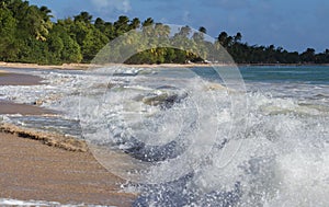 The waves on Caribbean beach, Martinique island.