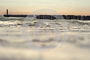 Waves clashing on the breakwater