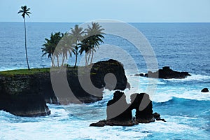 Waves and cliffs of a coast of sao tome and principe