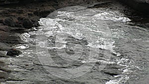 Waves on coast Galapagos Islands.