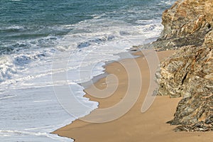 Waves and coastline at Loe Bar, Porthleven