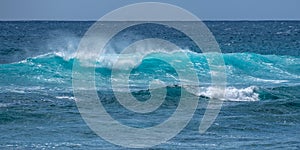 Waves in the surf from a beach in Hawaii