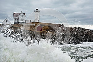 Waves Crash Around Cape Neddick (Nubble) Lighthouse As Storm Goes Out To Sea