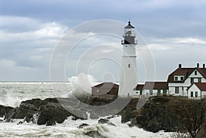 Waves Crash Next to Oldest Lighthouse in Maine photo