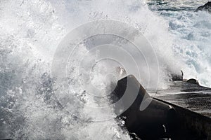 breaking waves at the jetty in Ulleungdo Island, South Korea