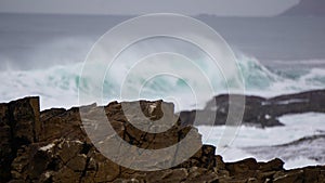 Waves crashing against rocks