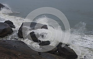 Waves crashing against rocks on a rocky coastline