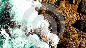 Waves crashing against the rocky shore of the north end of Maroubra Beach in Southeast Sydney.