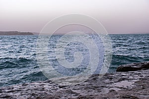 Waves crashing against shore at Canyon Lake, Texas