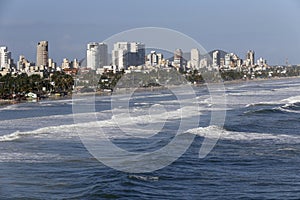 Waves crashing on the beach in Guaruja, Sao Paulo, Brazil