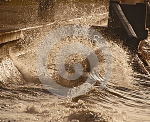 Waves crashing into the bulwark