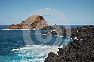 waves crashing on coastline volcanic rocks, ilheu mole Porto Moniz