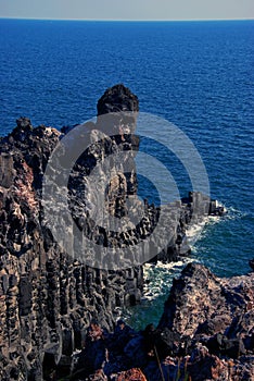 Waves crashing on Jeju seashore.