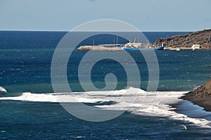 Waves crashing near port