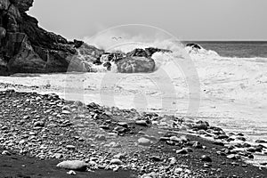 Waves crashing over rocks at Ajuy, Fuerteventura, Spain