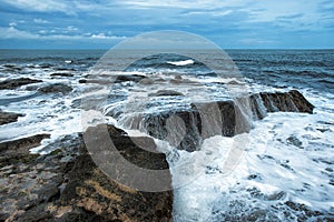 Waves Crashing Over Rocks on the Bali Coastline