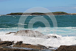 Waves Crashing Over Rocks at Catherine Hill Bay, Moonee Beach New South Wales, Australia