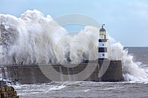Waves crashing over Seaham Lighthouse - England
