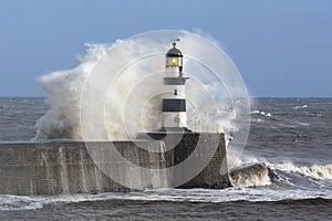 Waves crashing over Seaham Lighthouse photo