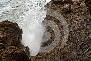 Waves crashing into rocks