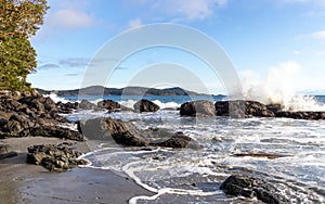 Waves crashing on the rocky coast at Becher Bay photo