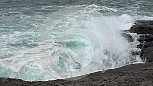 Waves crushing the coast line, rocks