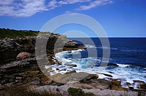 Waves eroding the cliffs of the New South Wales coast in Australia