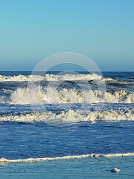 Waves and foam on the coast of the Atlantic Ocean Argentina