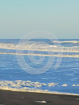 Waves and foam on the coast of the Atlantic Ocean Argentina