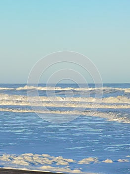 Waves and foam on the coast of the Atlantic Ocean Argentina