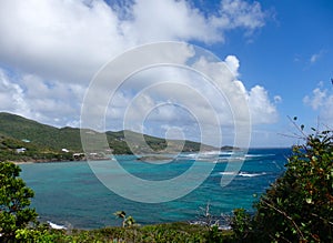 Waves foaming over reefs in the windward islands