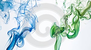 Waves of green and blue smoke create an ethereal and fluid form on a white background, suggesting graceful movement