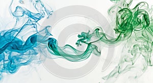 Waves of green and blue smoke create an ethereal and fluid form on a white background, suggesting graceful movement