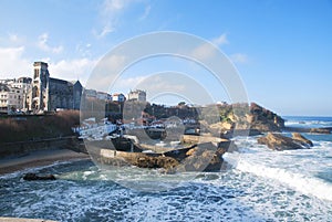 Waves in harbour of Biarritz photo