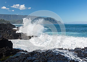 Waves hit rocks at Queens Bath Kauai