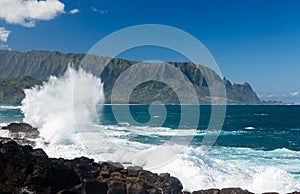 Waves hit rocks at Queens Bath Kauai