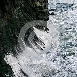 Waves hiting basalt collum beach in Iceland