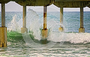 Waves Hitting Pier, San Diego California photo