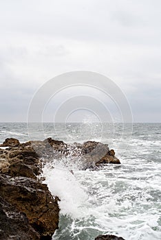 Waves hitting rocks at Black Sea