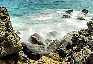Waves hitting the rocks at Zuma Beach, long exposure, silk water - Zuma Beach, Los Angeles, LA, California, CA
