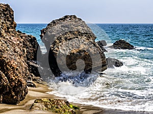 Waves hitting the rocks at Zuma Beach - Zuma Beach, Los Angeles, LA, California, CA
