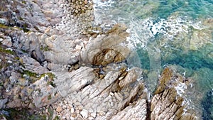 Waves hitting rocky coastline in Santa Teresa Gallura, Sardinia, Italy