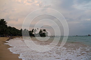 Indian ocean with sri lanka coastal sand