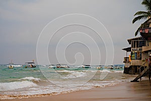 Indian ocean with sri lanka coastal sand