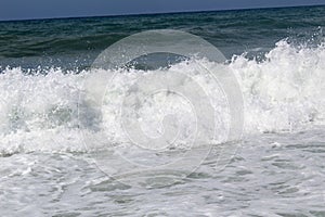 Waves of the Mediterranean Sea are rolling ashore Alanya, Turkey